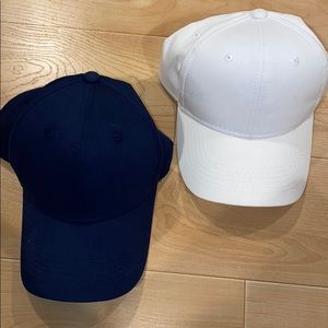 Two baseball caps